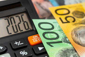 Australia money. Finances 2026. Business and economic concept. Symbol of the Australian dollar. Year 2026 displayed on a calculator. Financial background. Close up