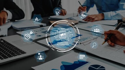 Business professionals collaborate during a marketing automation meeting, utilizing digital tools and visual data analytics to drive strategy and innovation. Raster - Powered by Adobe