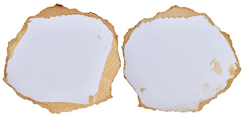 Two round torn pieces of paper with coffee stains on an isolated background