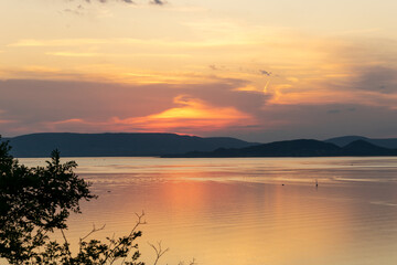 Obraz premium Beautiful sunset over Lake Balaton. Orange sky. Summer, Hungary.