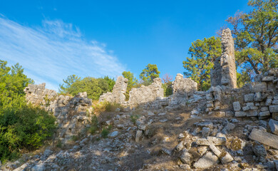 Ruins of ancient Phaselis, Antalya province. Turkey ancient city, streets, columns, buildings, scattered stones and parts of ruins and artifacts