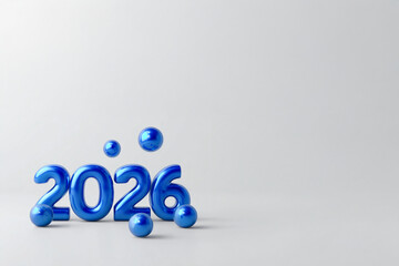 Nombre 2026 bleu brillantsen volume pos&eacute;s sur fond clair minimaliste avec espace n&eacute;gatif copyspace, concept festif pour nouvel an, Saint Sylvestre et toute autre f&ecirc;te de l&rsquo;ann&eacute;e
