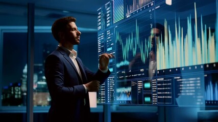 Business professional analyzing digital data on interactive screens in modern office - Powered by Adobe