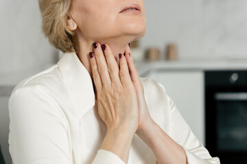 Checking lymph nodes due to sore throat and discomfort in neck region