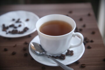 cup of coffee with beans