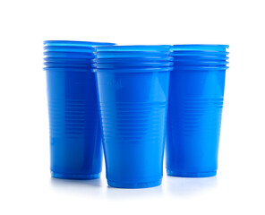 Blue plastic cups on white background