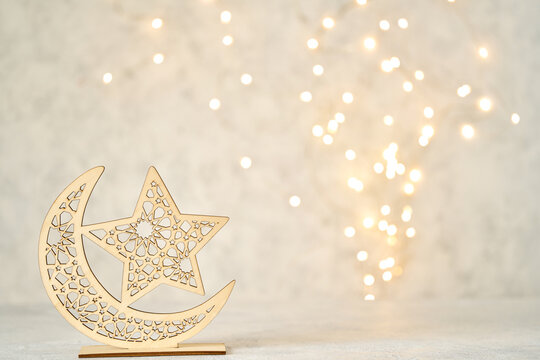 Ramadan kareem background . Crescent moon decor over light bokeh background