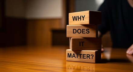 Why Does It Matter Question on Wooden Blocks Stacked on a Table.