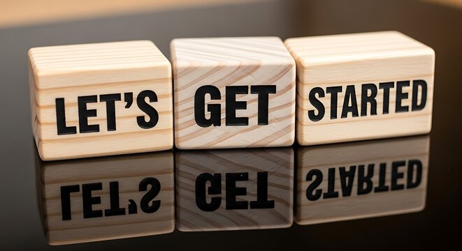Lets Get Started wooden blocks on reflective surface.