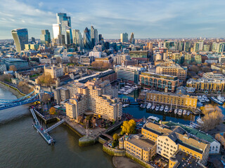 St Katharine Docks. Aerial drone view of Saintt Katharine Docks in London - historic marina, yachts and modern city architecture