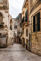 Fototapeta premium Old town Matera, Basilicata, Apulia or Puglia, Italy. Picturesque streets and corners in the old town