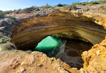 sunrise at sea cave in portugal