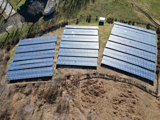 Aerial View of Mountain Solar Panels in Photovoltaic Plant for Green Energy