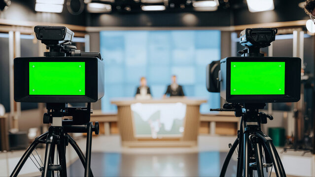Professional television studio with green screen cameras