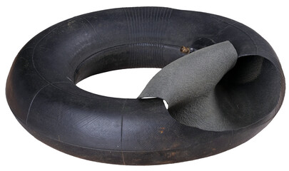 Torn inner tube from a small diameter tire. Isolated background.