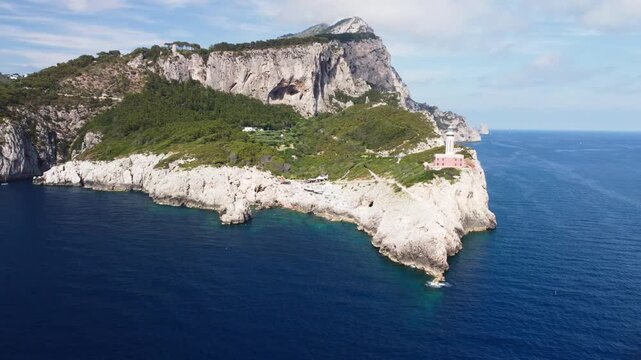 Amazing aerial view of Capri coastline along the lighthouse in summer season