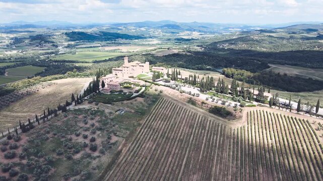 Banfi Castle in Tuscany, view in spring season from drone