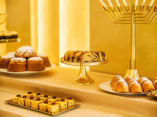 a table with a variety of desserts on it