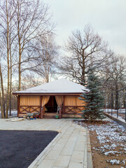 Wooden Church Refectory Under Construction in Orthodox Parish Yard