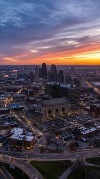 Kansas City Skyline at Dusk with Vibrant Orange Sunset Over Cityscape
