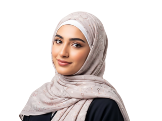 A smiling woman wearing a traditional hijab and black clothing stands against a white background