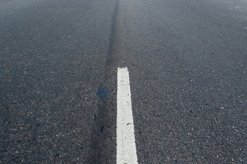 White traffic lane marking on a street in Rio de Janeiro.