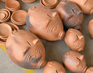 hand made clay dishes and piggy banks