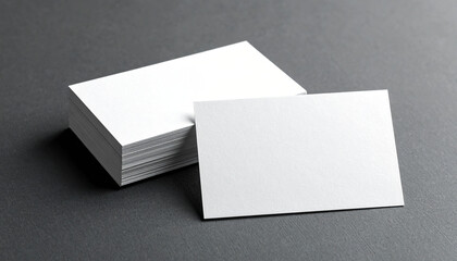 Blank Business Card Stack Mockup on a dark gray background