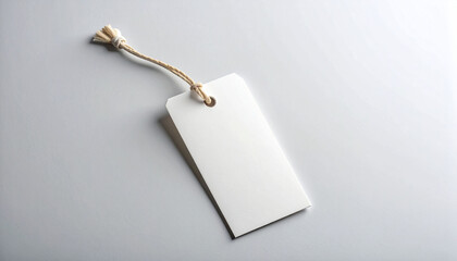 Blank White Price Tag Mockup with String on Gray Background