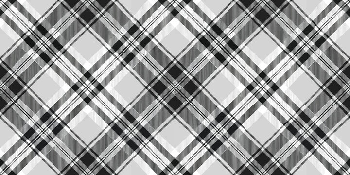 Elegant monochrome plaid pattern featuring shades of black, white, and gray, suitable for textiles and backgrounds.