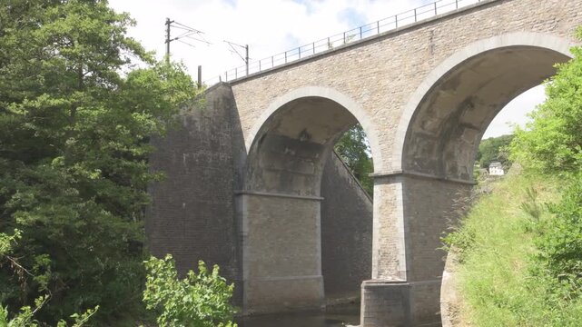 An Ancient Stone Arch Bridge in Belgium or Europe