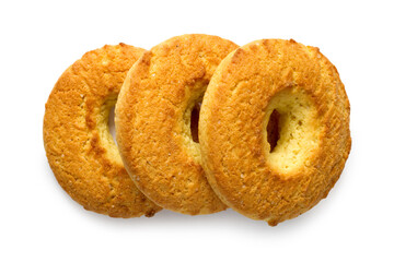 Three round cookies with a hole on a white background. Close-up of cookies
