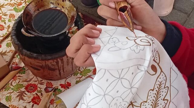 hand girl coloring fabric clothes