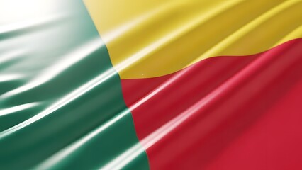 Obraz premium Close-up view of the national flag of Benin waving with a glossy, silky texture, showcasing its vibrant green, yellow, and red colors.