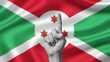 A grayscale human hand with an index finger raised upwards, set against the vibrant, waving national flag of Burundi.