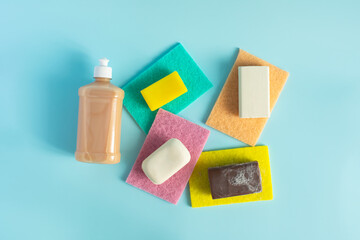 Soap as a means of protection from pollution. Various types of soap close-up on a light background top view