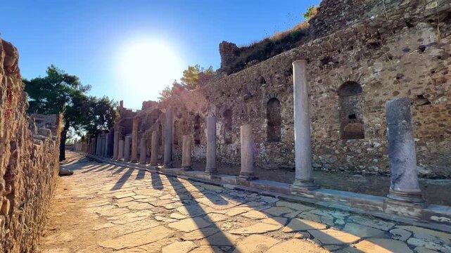 Ruins of the ancient Roman port city of Siedra in Alanya, Antalya, Turkey. The street and ruins of the ancient abandoned ancient city of Siedra on the Mediterranean coast. 4К