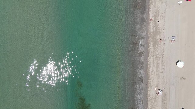 Aerial view of Playa de la Rada in Estepona, filmed with DJI Mini 4 Pro at Andalucia, Spain in 2024.