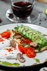Baguette with guacamole, champignons mushrooms and micro green on white plate. Brunch ideas. Vegan protein source. healthy food. clean eating.