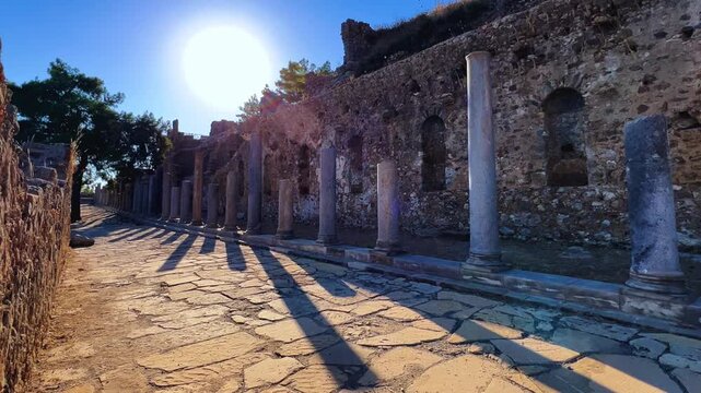 Ruins of the ancient Roman port city of Siedra in Alanya, Antalya, Turkey. The street and ruins of the ancient abandoned ancient city of Siedra on the Mediterranean coast. 4К