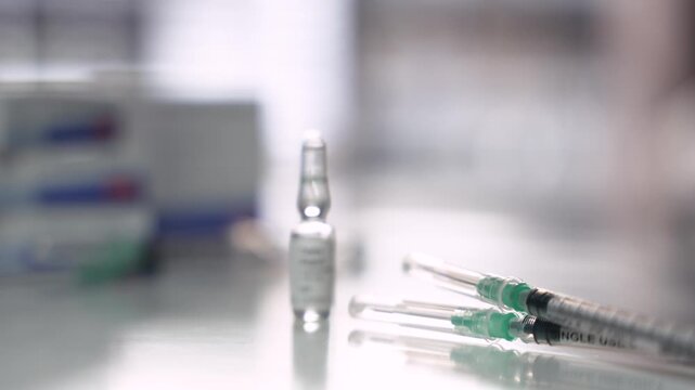 Focus Pull from Syringes to Testosterone Ampoule, TRT Clinical Concept