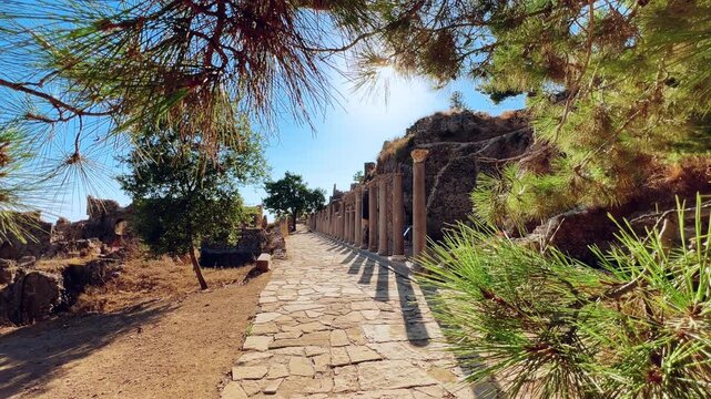 Ruins of the ancient Roman port city of Siedra in Alanya, Antalya, Turkey. The street and ruins of the ancient abandoned ancient city of Siedra on the Mediterranean coast. 4К