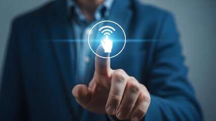 Close-up of a businessman's index finger touching a glowing icon representing connectivity and Wi-Fi signals