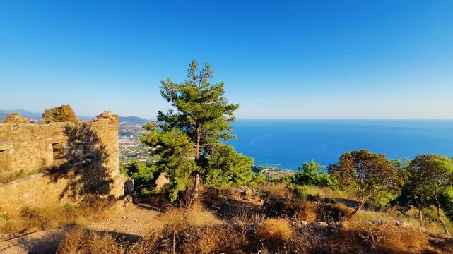 Ruins of the ancient Roman port city of Siedra in Alanya, Antalya, Turkey. The street and ruins of the ancient abandoned ancient city of Siedra on the Mediterranean coast. 4К