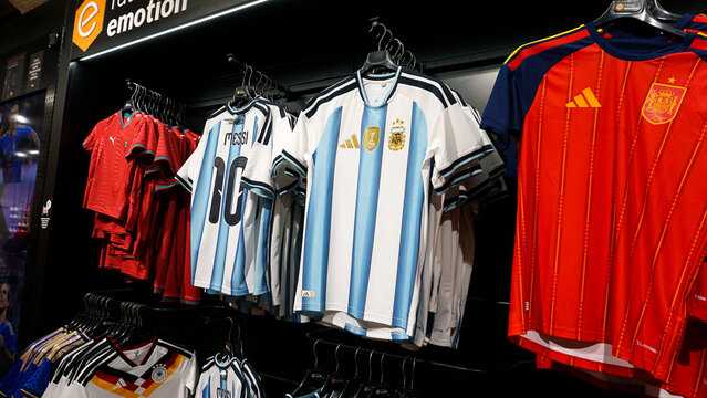 Palma, Mallorca, Spain - December 16, 2025: A blue and white Argentina men's national soccer or football jersey is on display inside a store
