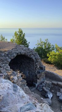 Ruins of the ancient Roman port city of Siedra in Alanya, Antalya, Turkey. The street and ruins of the ancient abandoned ancient city of Siedra on the Mediterranean coast. 4К