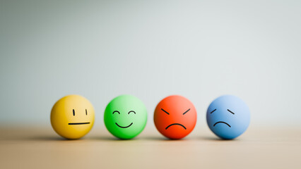 Four Diverse Emoji Face Spheres Expressing Emotions Copy Space. 3d rendering
