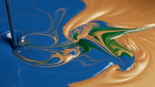A visually pleasing abstract flow of deep azure and soft amber liquid paints blending together in perfect slow motion harmony fluid movement, corporate video, visual