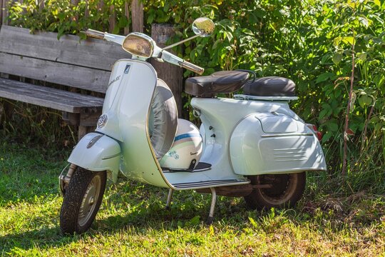 Vintage light-blue Vespa scooter