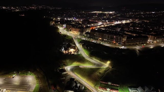 Drone hyperlapse of Saltburn by the sea flying towards the hill with car light trails, taken early morning in December 2025
